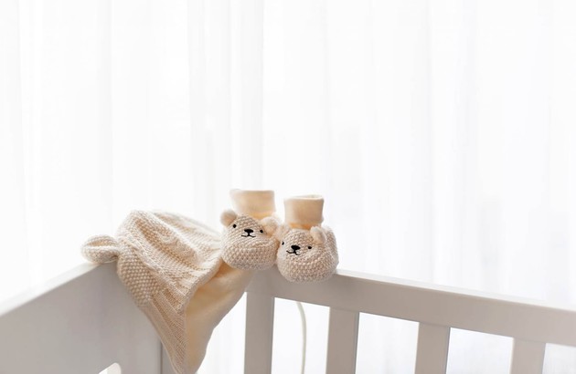 Chambre de bébé et chaussons