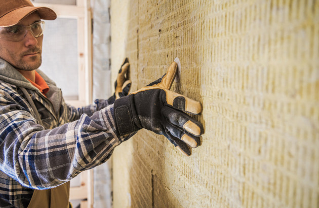 Pourquoi mettre une plaque murale derrière un poêle