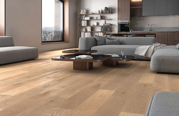 Salon moderne avec carrelage effet bois foncé pour une ambiance chaleureuse et design.
