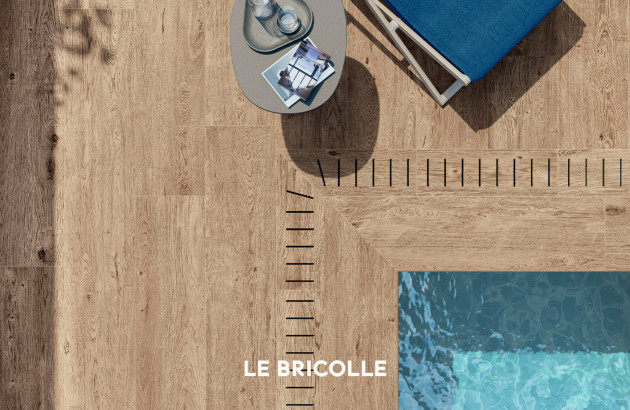 Carrelage terrasse imitation vieux chêne Le bricolle de Novabell aux abords d'une piscine