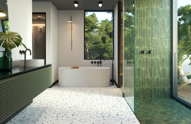 Salle de bains avec du carrelage zellige vert aux murs