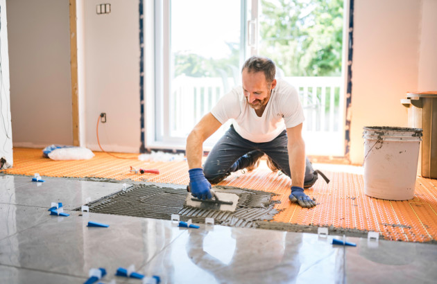 Pose carrelage sur sous couche textile étanche.