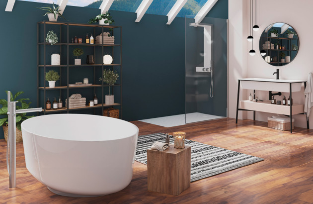 Salle de bains avec baignoire îlot et douche à l'italienne avec paroi de douche transparente