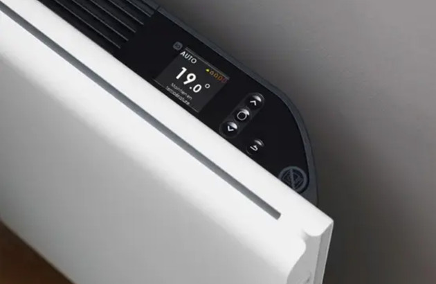 Vue sur le thermostat d'un radiateur réglé à 19°C