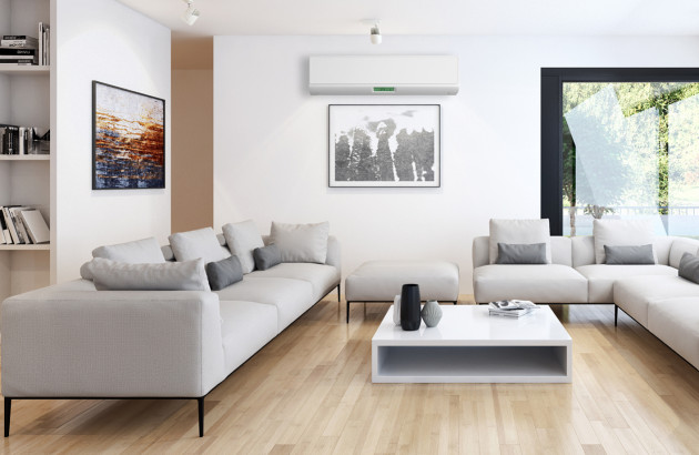 Salon lumineux équipé d’une climatisation réversible murale, solution idéale pour chauffage et rafraîchissement