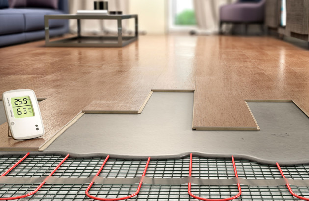 Plancher chauffant posé en dessous du carrelage