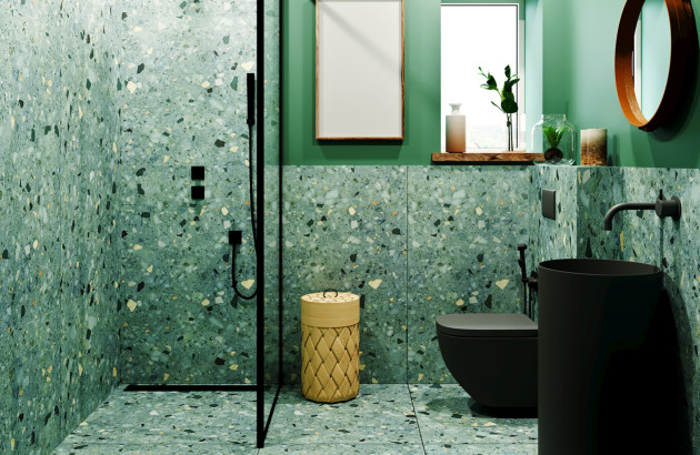 Douche ambiance verte avec des carreaux de faïence au mur