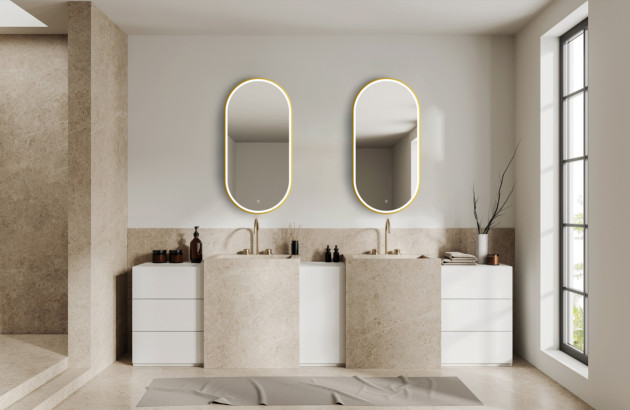 Salle de bains moderne avec double vasque minérale et miroirs rétroéclairés.