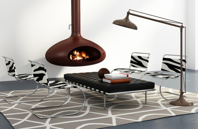 Salon au style moderne futuriste avec un poele à bois suspendu