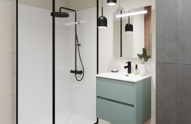 Petite salle de bains moderne avec douche et meuble vasque suspendu.