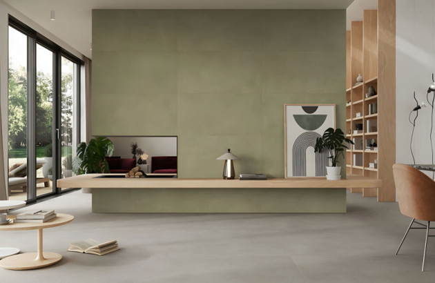 Grande pièce à vivre avec du carrelage imitation béton