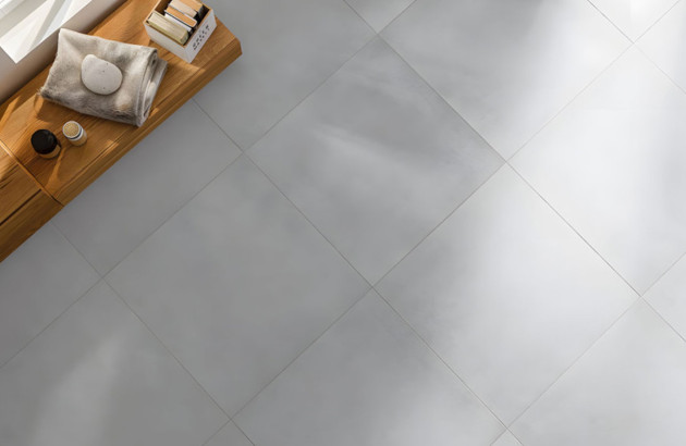 Sol de maison avec du carrelage au sol grand format effet béton
