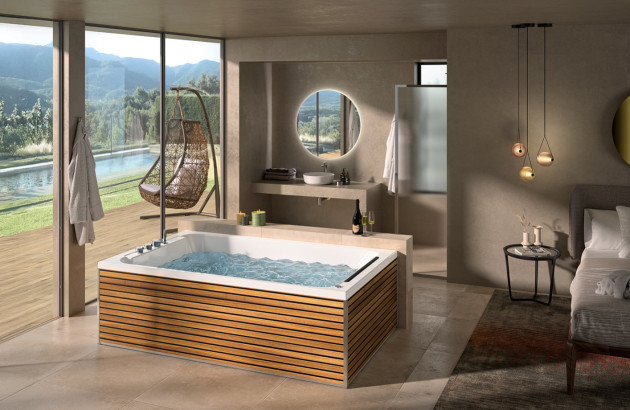Espace bien-être luxueux avec baignoire balnéo, vue panoramique sur la nature et décoration contemporaine.