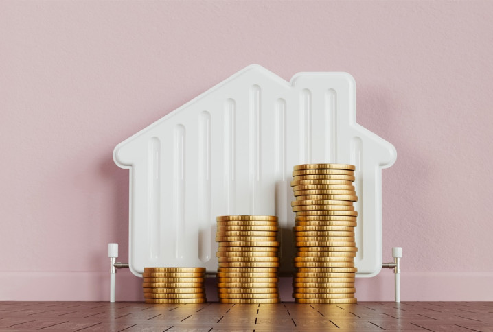 radiateur en forme de maison avec des pièces de monnaie 