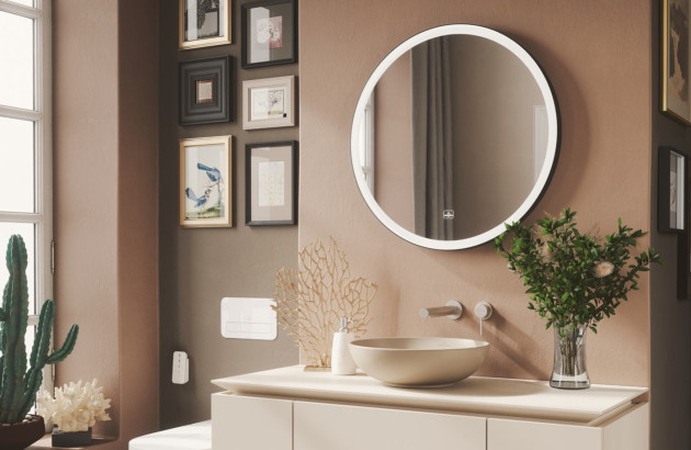 Miroir rond blanc dans une salle de bains