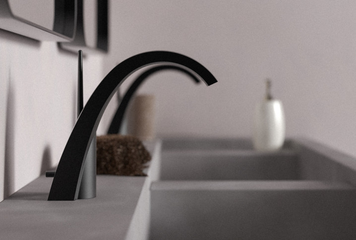 Mitigeur noir mat design installé sur un plan vasque moderne avec double lavabo aux lignes épurées.