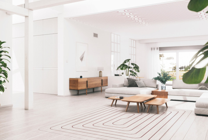 Grand salon de maison avec un plancher chauffant au sol