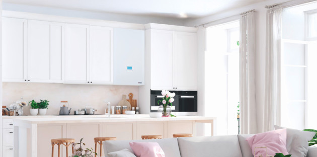 Grande cuisine qui contient une chaudière gaz