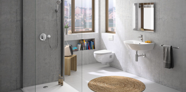 Salle de bains contemporaine avec douche à l’italienne vitrée, WC suspendu et lavabo mural.