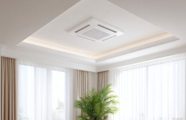Climatisation gainable intégrée dans un faux plafond, installation discrète dans un intérieur lumineux.